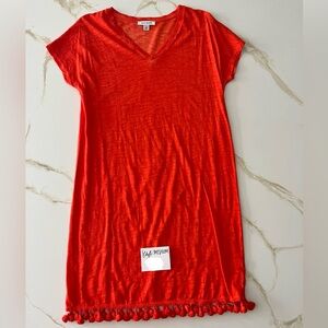 Size M mini t-shirt dress with tassles at hem. Good condition - only worn once.